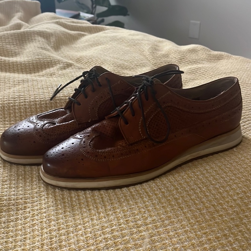 Dress shoes with rubber comfy bottoms.